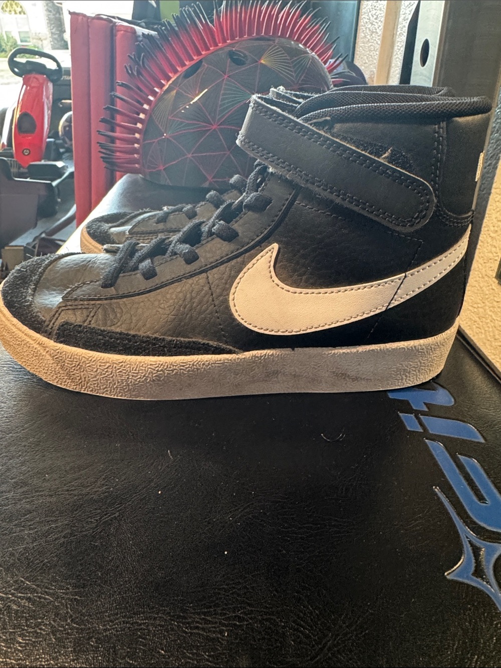 Nike Kids Black High-Top Sneaker with White Swoosh Accent